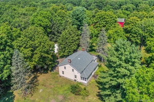 Step into the timeless beauty of 441 North Ohioville Road in New Paltz, where history and nature converge.