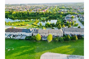 True Freehold Townhouse Private Pond Views No Neighbours Behind No Sidewalk 3 Car Parking.