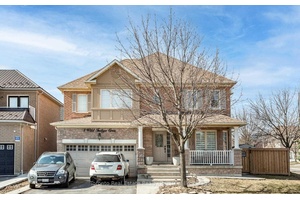 Bright and spacious main and upper floors of a detached home in Springdale for lease, offering a welcoming 18 ft living room, dining room, and family room, plus a convenient ...