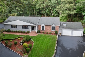 Completely renovated and move in ready, this modern ranch blends privacy, luxury, and convenience.