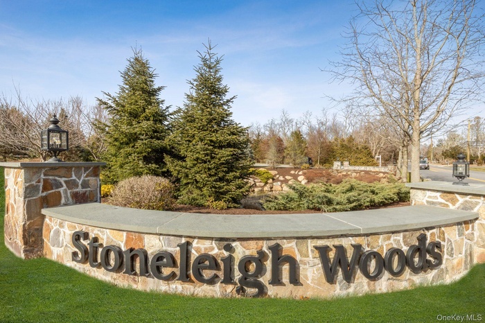 Community sign featuring a patio