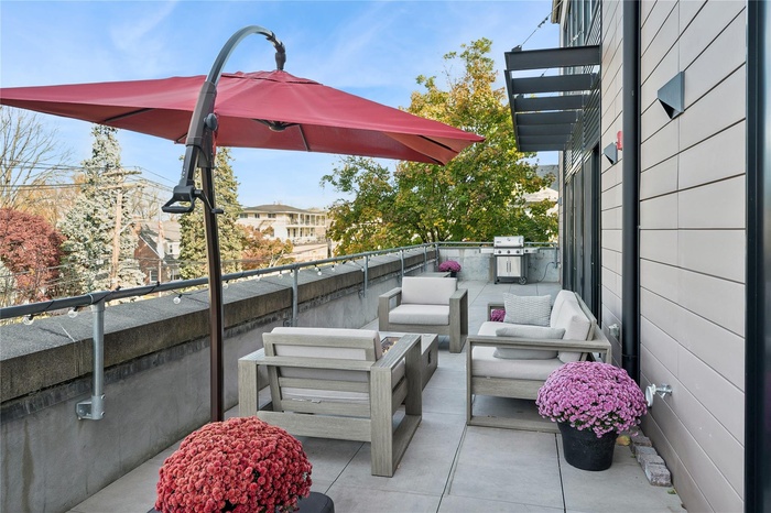 View of patio / terrace featuring a balcony, outdoor lounge area, and grilling area
