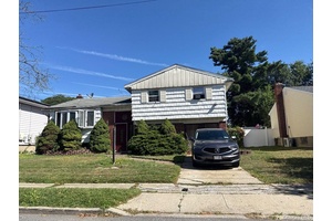 Split Style Home. This Home Features 3 Bedrooms, 1.