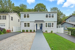 Welcome to this impeccably renovated two family residence located in the heart of Elmsford.