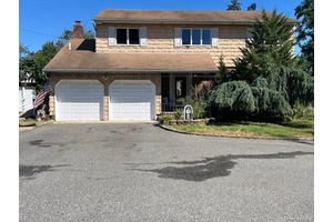 Colonial set up for the Extended Family Converted Garage Wood Floors Desirable Hauppauge Schools Large Circular Driveway Gas Heat Cedar Closet Large T Shape Pool Needs Liner Virtual Tour http ...