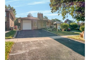 Updated family home with up to 5 bedrooms, inground pool, and a separate basement entrance for the extended family or income potential in a prime Etobicoke Location.