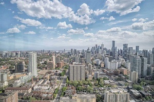 Stunning Sub Penthouse Corner Suite Spacious 2 Bedroom, 2 Bath with 908 SF of living space 50 SF balcony showcasing spectacular, unobstructed south east city views.