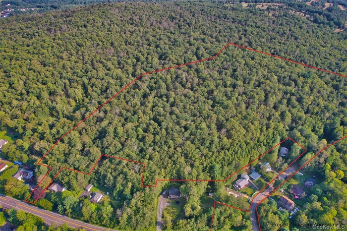 Aerial view of property's location featuring property parcel outlined