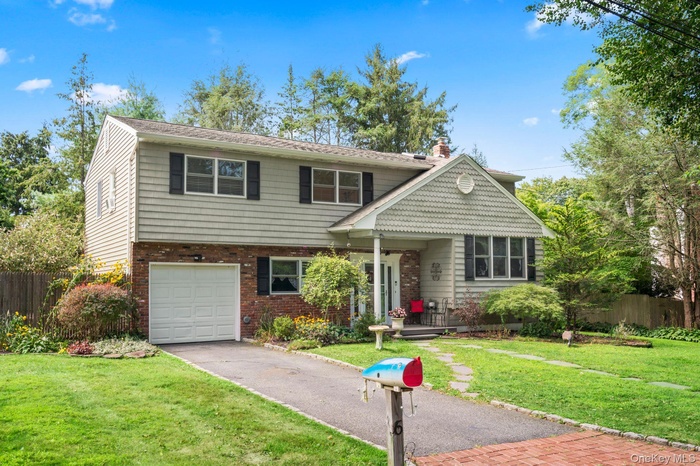 Welcome to 6 Emil Court. Tucked away on a cul-de- sac north of 25A