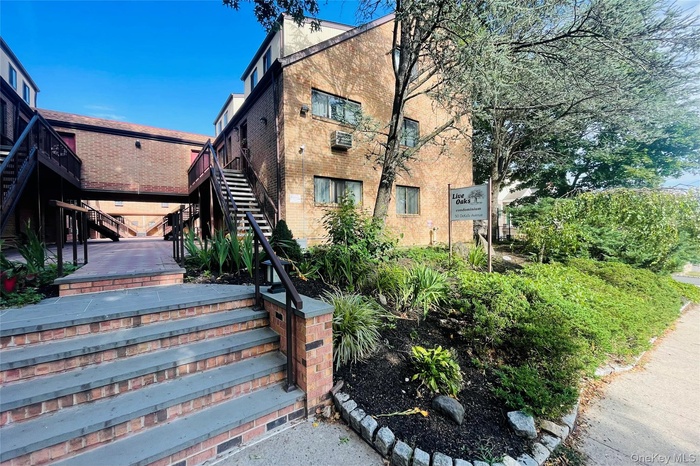 View of property with stairway