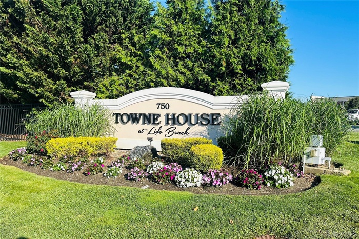 Community sign with a yard