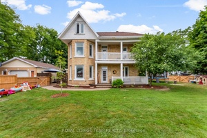 Welcome to this stunning 2 story century home that looks like it was plucked straight from the pages of a fairytale.