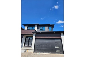 Welcome to modern sophistication in the picturesque West Galt neighborhood of Cambridge.