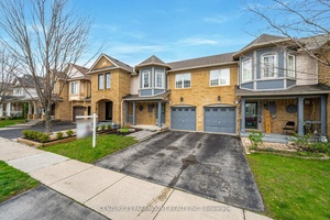 Move in ready 3 bedroom townhouse with no maintenance fees, featuring a brand new kitchen 2025 and finished basement 2025 with 1 room, full washroom, and wet bar with building ...