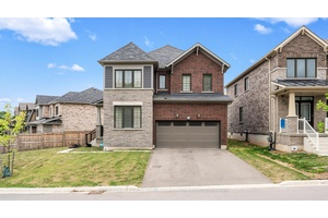 This stunning corner home is situated on a premium lot, offering beautiful green space views and a peaceful lake at the back.