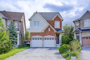 Welcome to 36 Shell Court a stunning 5 Bedroom home situated in the desirable Rouge Woods community !