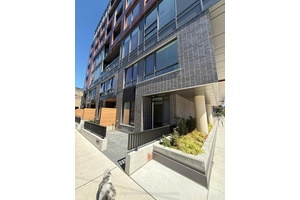 This modern two storey corner townhome offers 1, 237 square feet of living space in Toronto's vibrant Canary District.