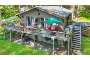 Situated on a pristine mountain lake this picture perfect home is waiting for you !
