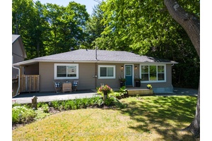 This move in ready bungalow, lovingly renovated in 2019, offers charm and comfort.