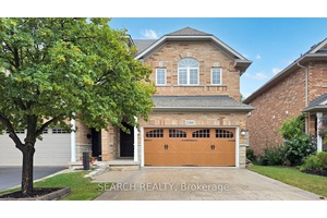 Executive 3 Bedroom Semi with approx 2100 sq ft of livable area with rare double drive garage in desirable child friendly Westmount neighbourhood.