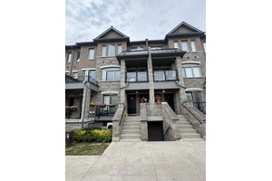 Discover elevated living at 200 Veterans Drive a beautifully designed stacked townhome featuring 3 spacious bedrooms, 2.