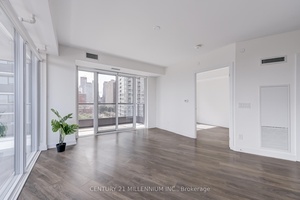 Spacious south and west facing downtown condo corner unit with 3 bedrooms, 2 bathrooms, and a large wrap around balcony.