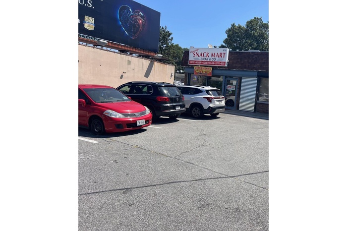 View of uncovered parking lot