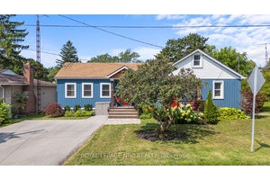 Welcome to 41 Haun Road in Crystal Beach a beautifully updated three bedroom bungalow perfectly located just minutes from Lake Erie's sandy shores.