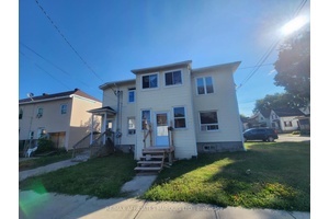 A lucrative investment opportunity awaits near the town center, offering unparalleled access to local amenities, perfect for tenants.