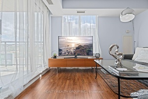 This spacious and bright 2 bed, 2 bath corner unit condo offers an exceptional layout with a windowed kitchen, open living and dining area, and plenty of natural light throughout.