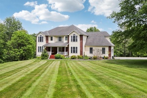 This beautiful home sits on 7.