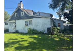 Great investment opportunity Legal 2 family home on 90 x 75 property.