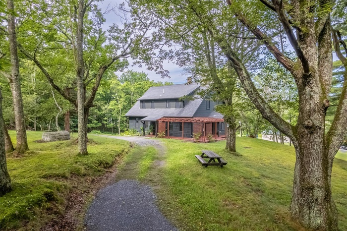 Front of home with yard