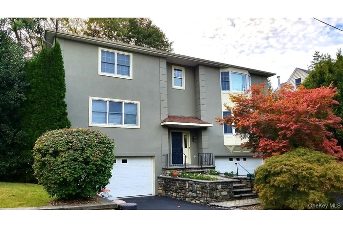 View of front of property featuring stucco siding