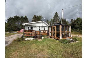 Welcome to this delightful 3 bedroom, 1 bathroom mobile nestled in a vibrant year round park.