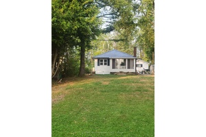 Waterfront Weekend Wonder at Mitchell Lake Welcome to your private slice of serenity 70 feet of lakeside charm with breathtaking westerly views that turn every sunset into a fiery masterpiece.