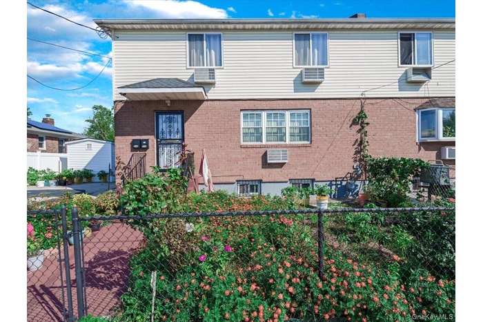 View of front of home with brick siding
