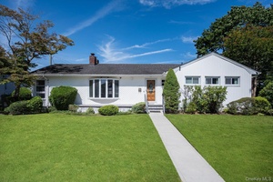 Expanded Ranch In The Heart Of East Meadow !