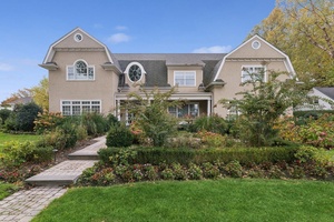 Nestled in the heart of Garden City s Central Section, this stunning Colonial, built in 2014, seamlessly blends classic elegance with modern luxury.