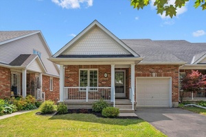 Beautifully renovated FREEHOLD townhouse bungalow tucked into Guelphs desirable east end !