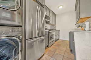 Top Floor 2 Bedroom Co op with Attic Deluxe 2 bedroom co op featuring efficiency kitchen, dining area, separate living room, and renovated bathroom.