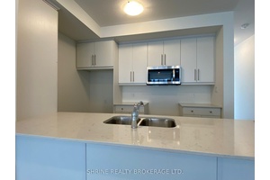 Welcome to this bright and modern townhome offering an open concept kitchen, dining, and living area filled with natural light, plus a convenient main floor powder room.