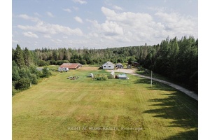 Set on 92 scenic acres, this charming country retreat offers room to live, work, and play.