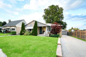 SPACIOUS BUNGALOW WITH SEPARATE ENTRANCE, OVERSIZED GARAGE amp ; PARK VIEWS IN PRIME AJAX LOCATION.