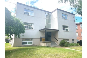 Attention Investors ! Well kept 3 story Stucco and brick 11plex Apartment Building with Healthy Cash Flows.