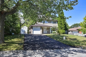 Located in a Secluded, Well Kept Neighborhood, Situated on a large 75 ft lot with mature trees and plenty of privacy.
