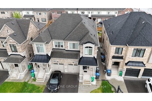 Newer Modern Open Concept, Legal Lower level in Semi Detached Home.