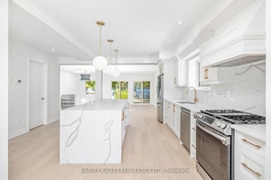 Welcome to to this beautifully fully renovated home tucked away on a quiet, tree lined street in one of Toronto's most charming neighbourhoods.