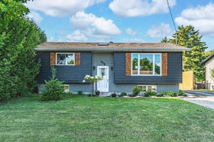 MOVE IN READY RAISED BUNGALOW CLOSE TO GEORGIAN BAY WITH MAJOR UPDATES !