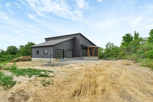 Discover refined rural living with this exquisite 1998 sqft new build by Hunt Custom Homes, thoughtfully crafted on a picturesque 9.